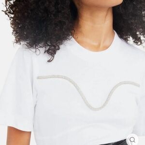 TANYA TAYLOR
Lenorah Top with a decorative crystal detailing along the bodice.